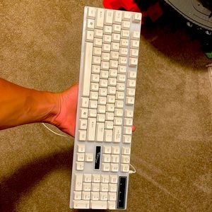 This is my keyboard it has a light up button and it turns to multiple colors.